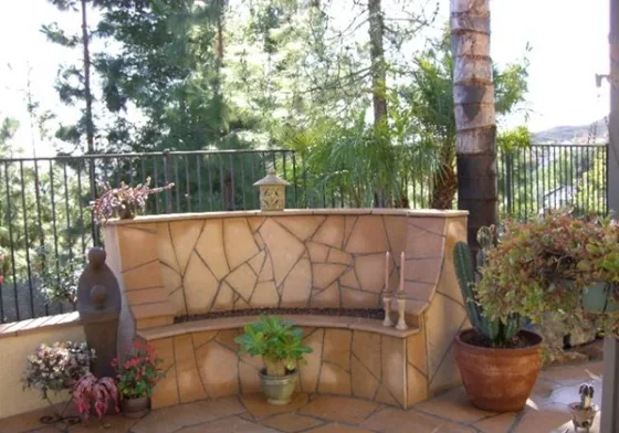 Stone-faced garden wall