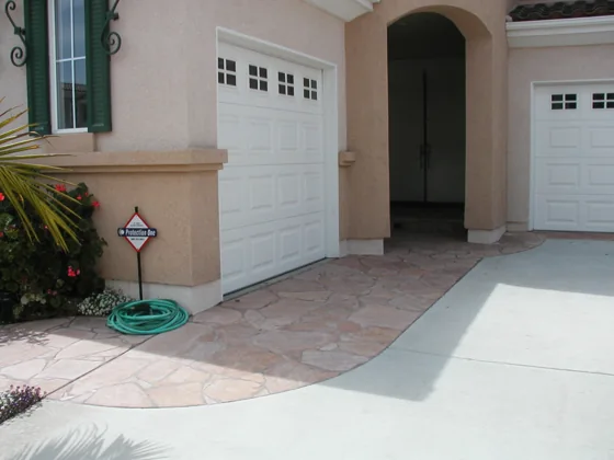 Paving beside a garage entrance