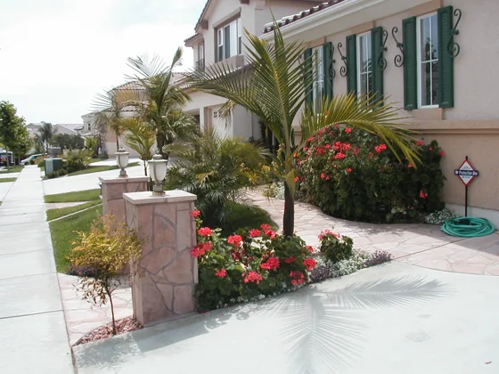 Front garden and stone entry pillars